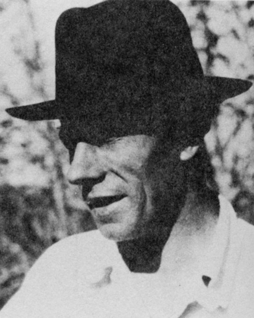 B. Traven in hat looking left