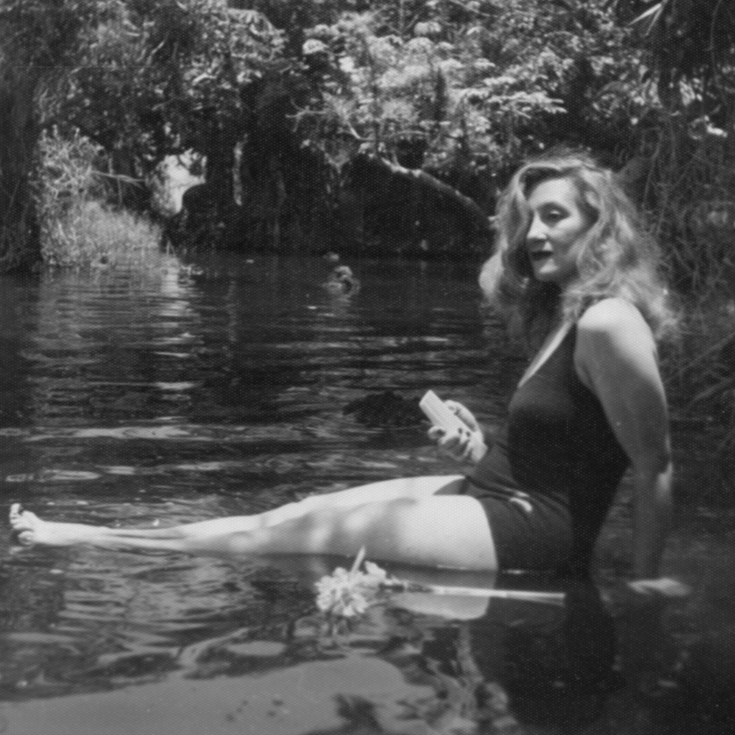 Esperanza Lopez Mateos bathing in lagoon