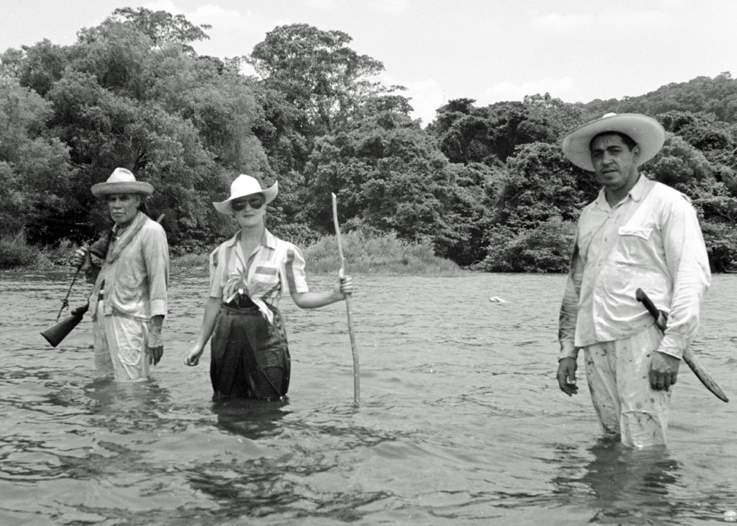 Esperanza with men hunting standing in water