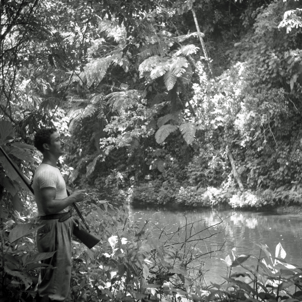 man hunting near lagoon