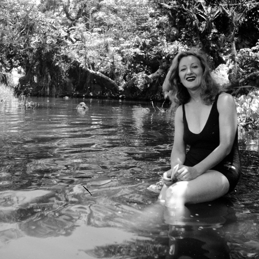 Esperanza in bathing suit in lagoon