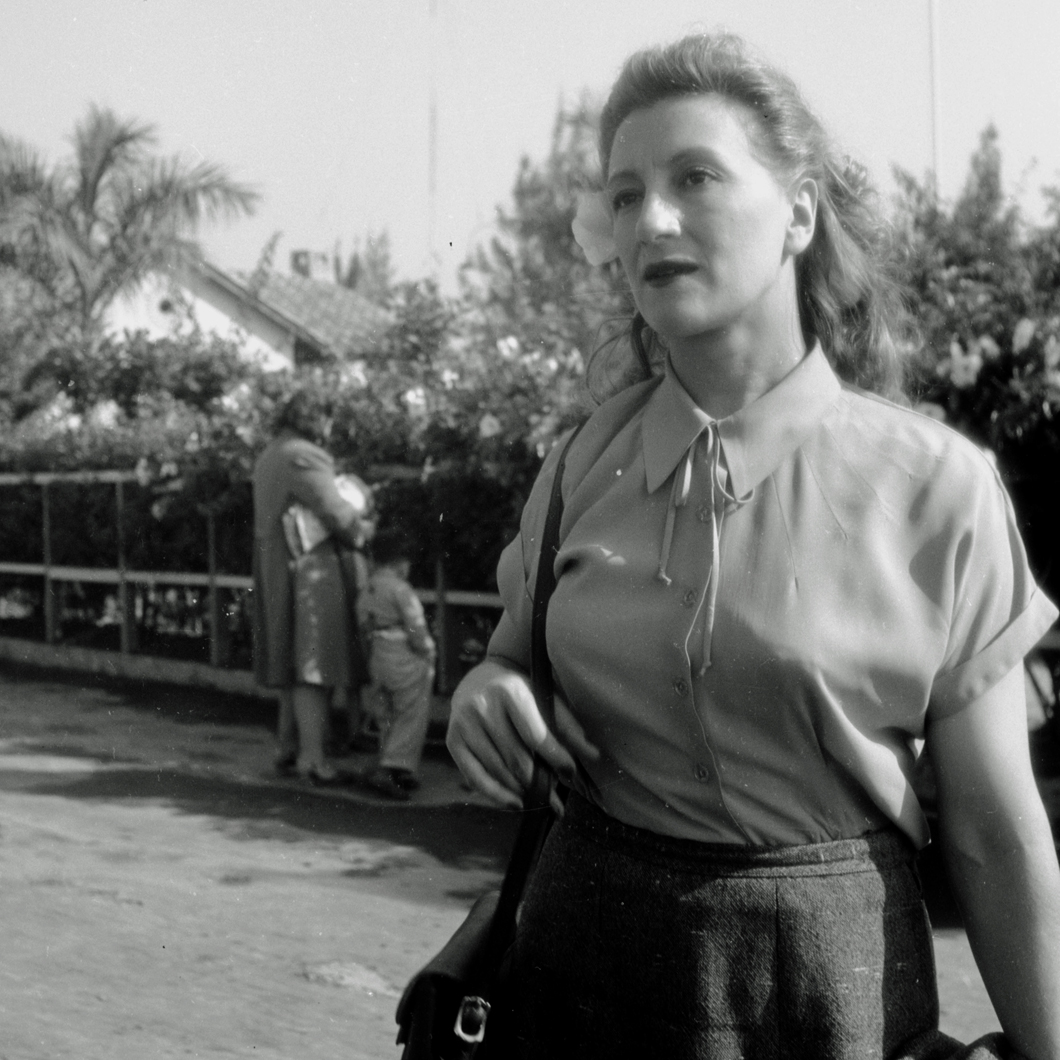 Esperanza standing in street